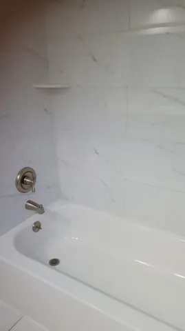 a bathroom with a bathtub