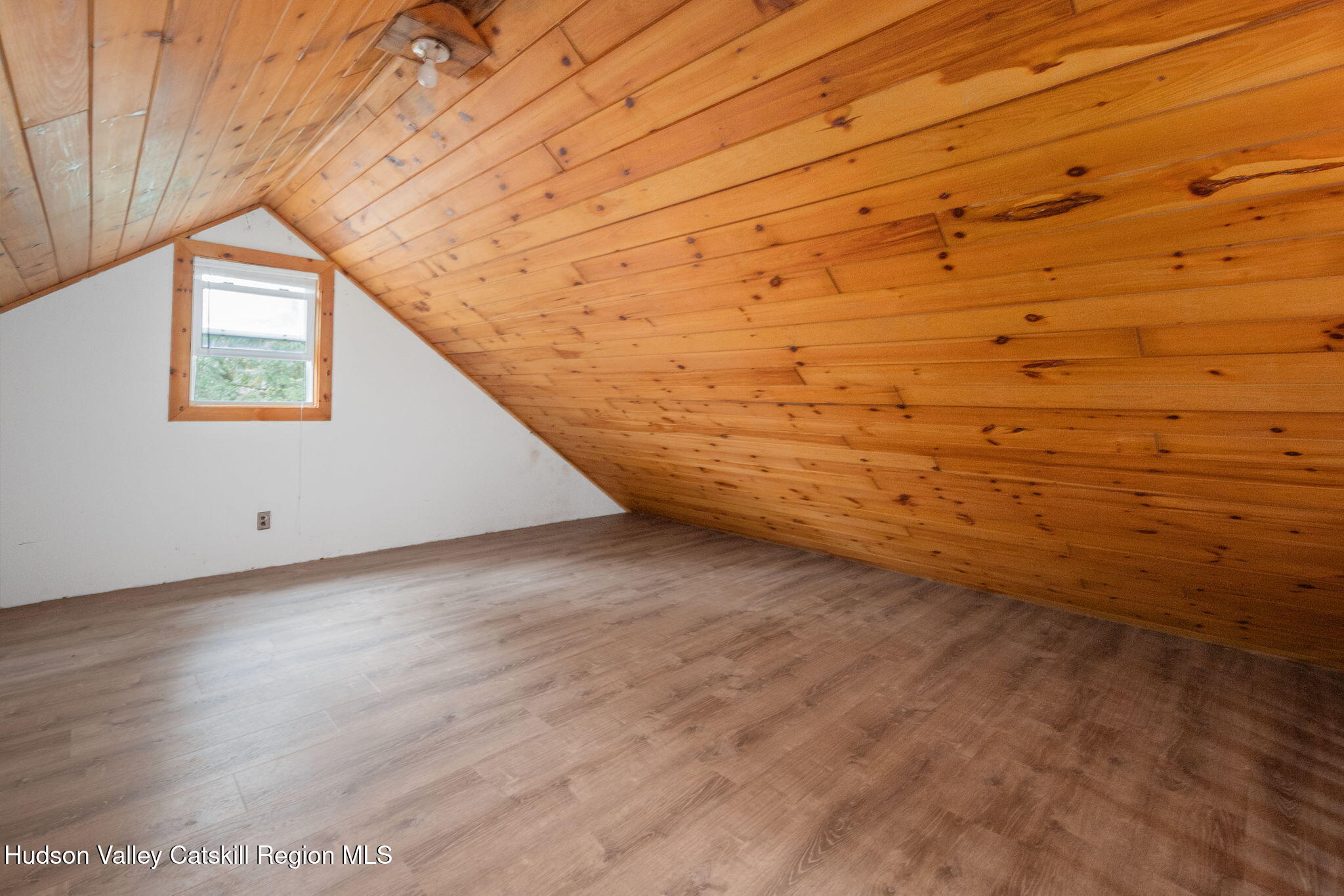 202 Blakesley Road, Unit PRIVATE Gilboa, NY 12076 - Photo 23 of 39 a view of wooden floor and brick walls