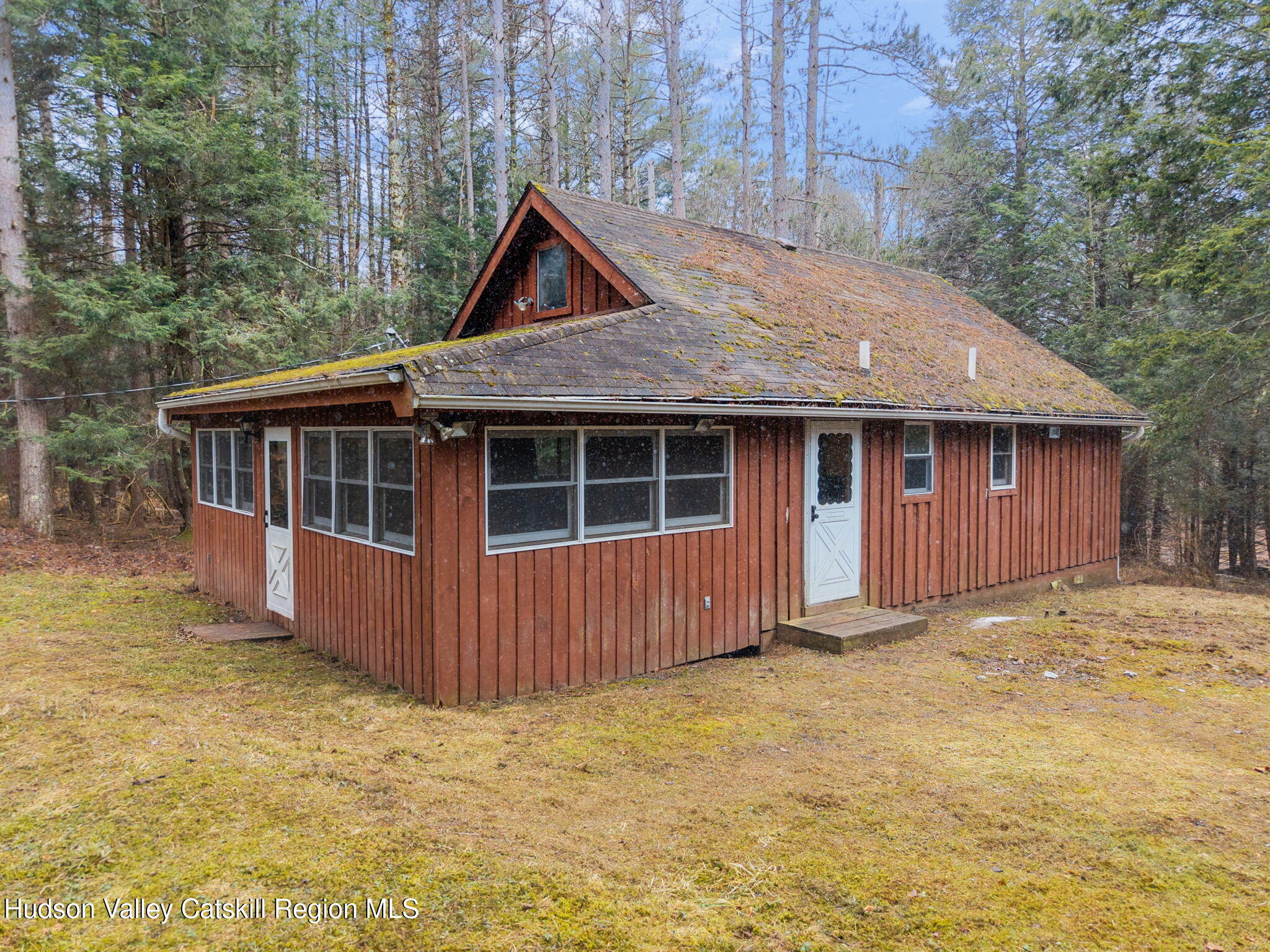 202 Blakesley Road, Unit PRIVATE Gilboa, NY 12076 - Photo 4 of 39 a front view of a house with yard