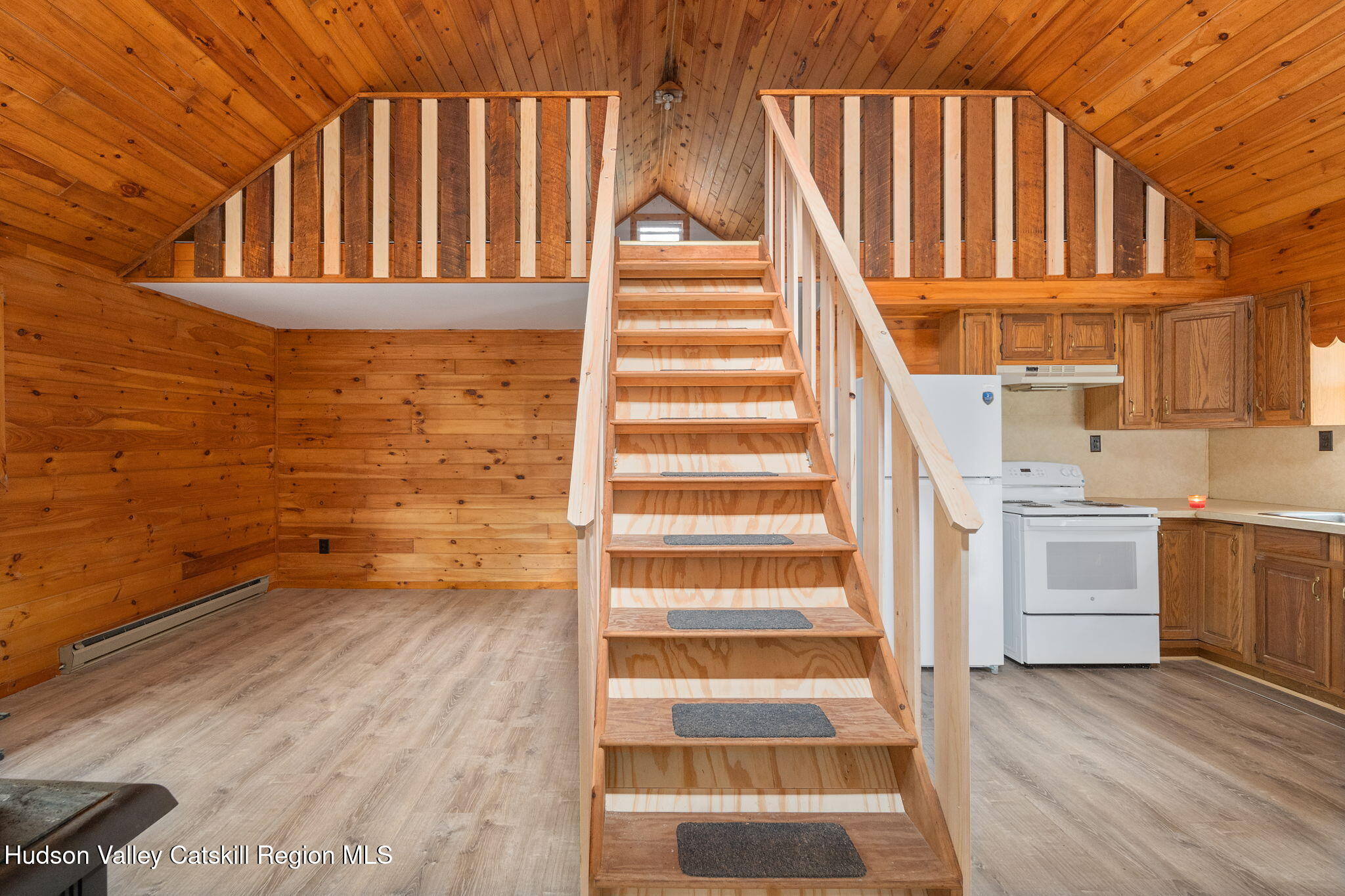 202 Blakesley Road, Unit PRIVATE Gilboa, NY 12076 - Photo 8 of 39 a view of staircase with white walls and a window