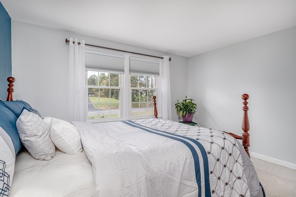 67 Bean Porridge Hill Road Westminster, MA 01473 - Photo 12 of 42 a bedroom with a bed and a window