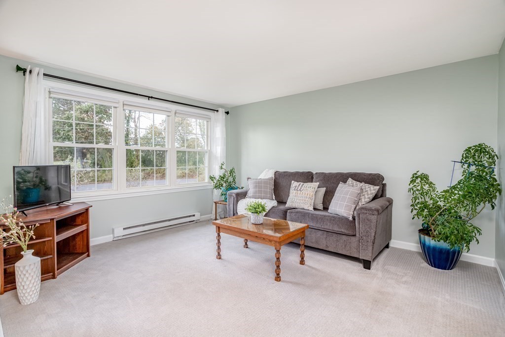 67 Bean Porridge Hill Road Westminster, MA 01473 - Photo 3 of 42 a living room with furniture and a flat screen tv