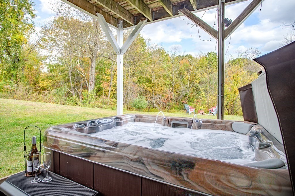 67 Bean Porridge Hill Road Westminster, MA 01473 - Photo 31 of 42 a bathroom with a granite countertop sink and a large mirror