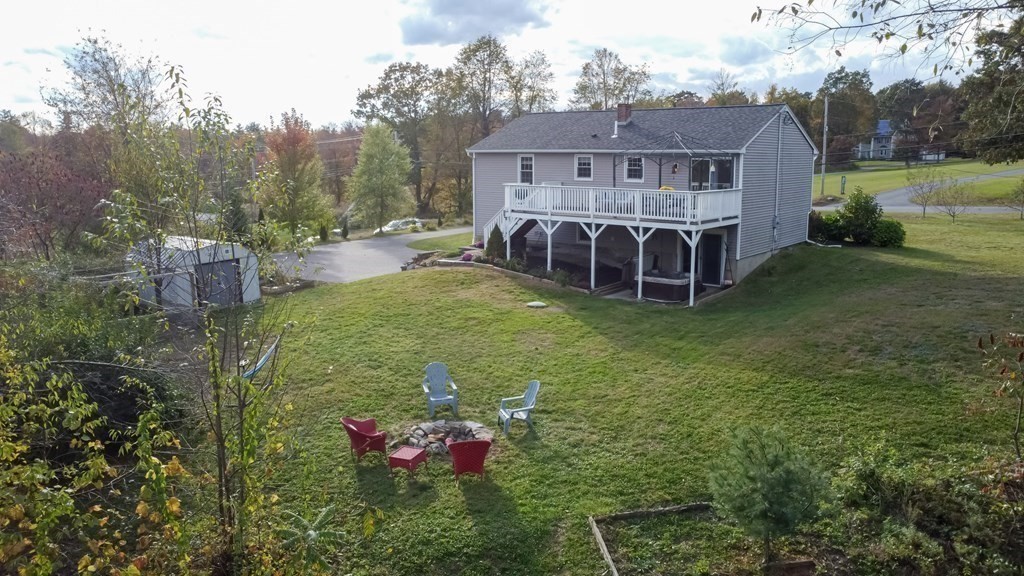 67 Bean Porridge Hill Road Westminster, MA 01473 - Photo 40 of 42 a view of a house with a yard and sitting area