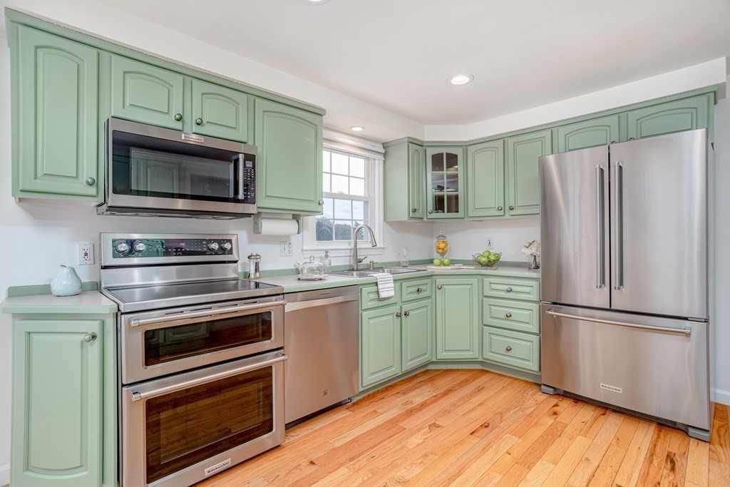 67 Bean Porridge Hill Road Westminster, MA 01473 - Photo 9 of 42 a kitchen with a sink stove and microwave