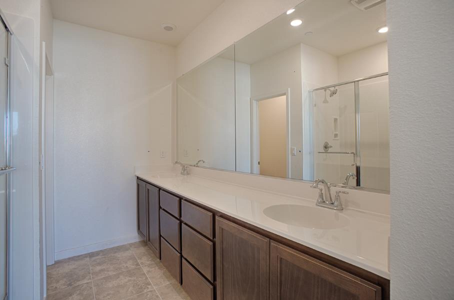 1672 17th Street Oakland, CA 94607 - Photo 22 of 24 a bathroom with a sink and a mirror