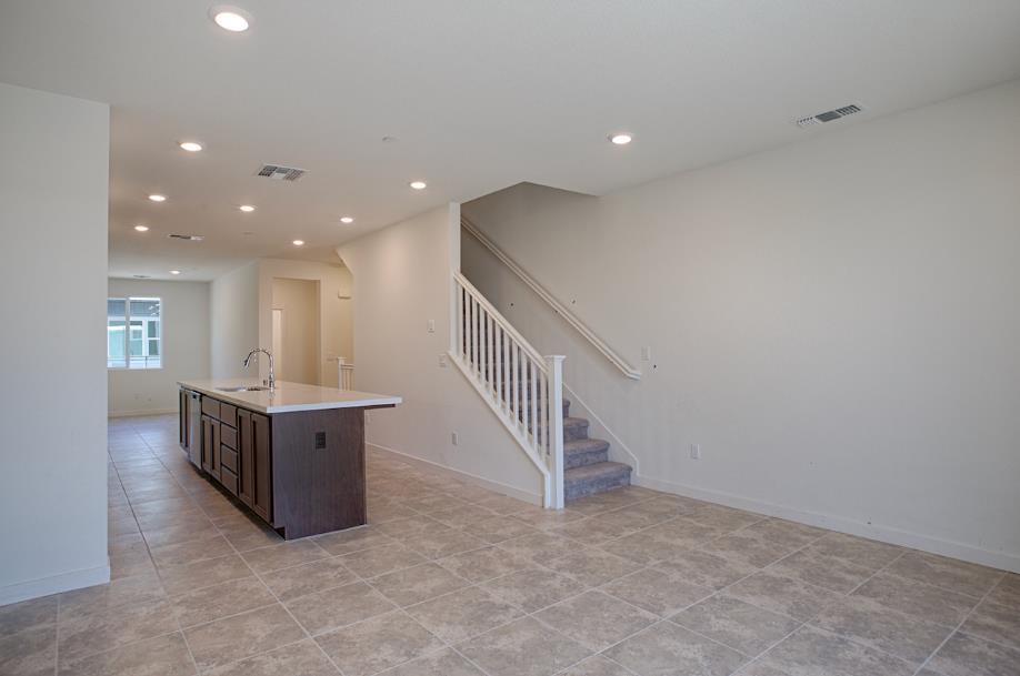 1672 17th Street Oakland, CA 94607 - Photo 7 of 24 a view of kitchen and hall with a sink