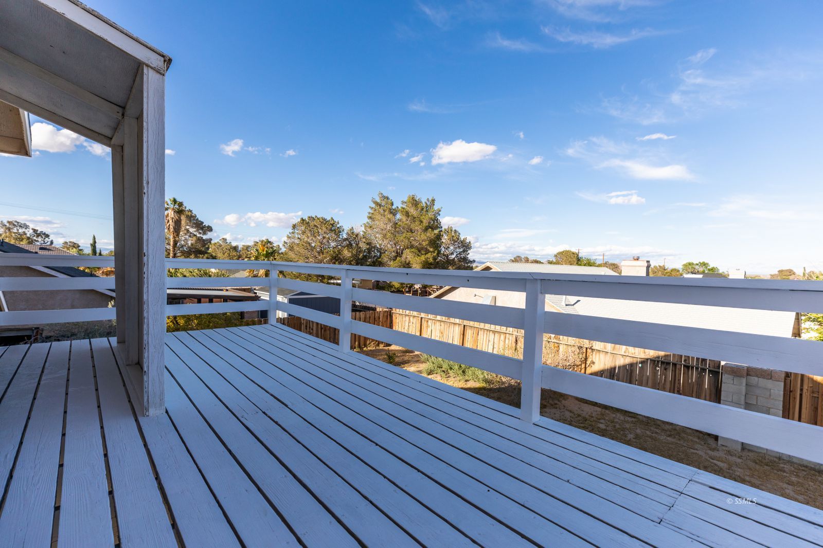 428 North Kern Street Ridgecrest, CA 93555 - Photo 21 of 30 a view of a balcony with wooden floor