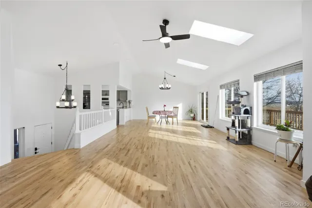 a view of a living room and hardwood floor