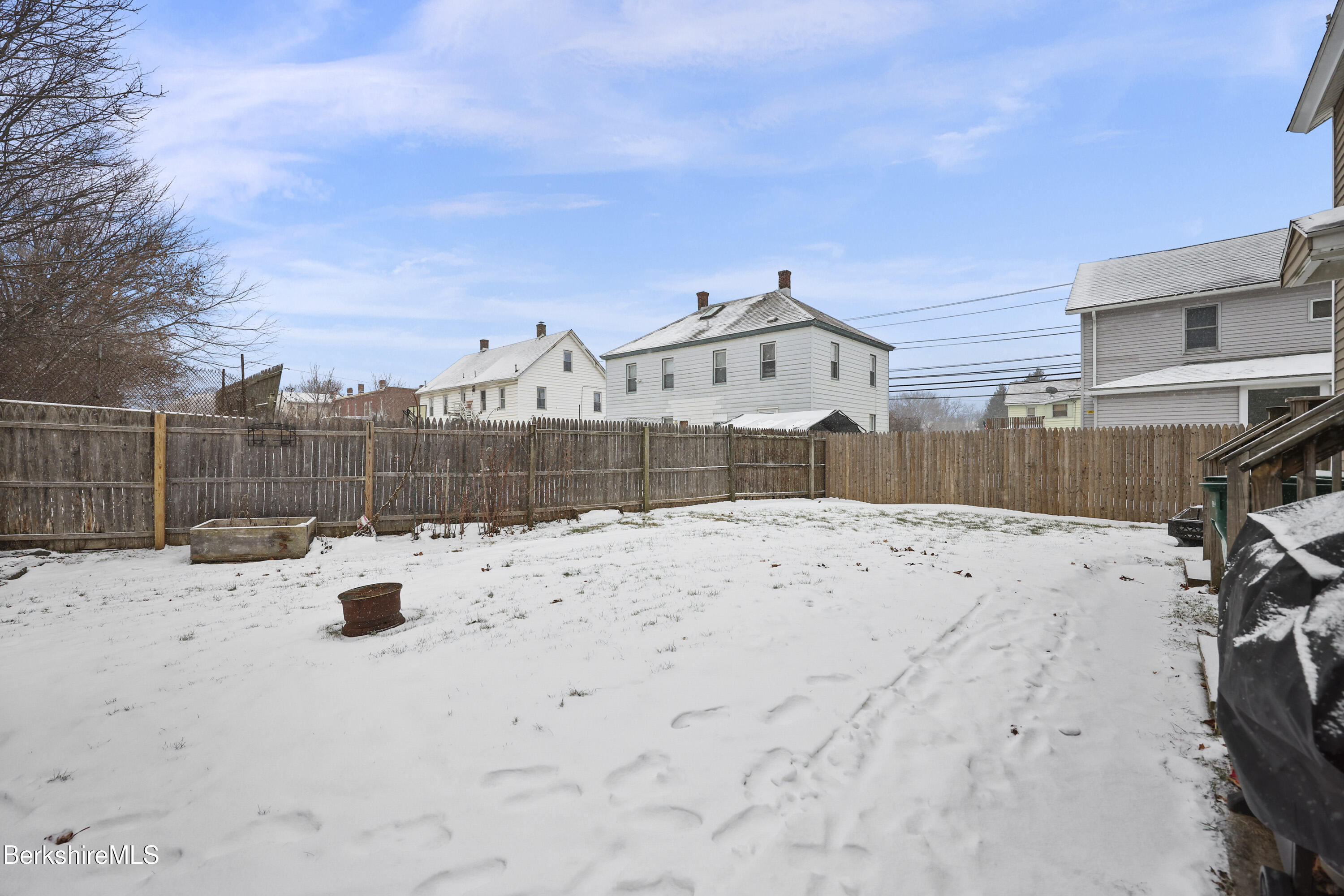 585-a & B State Road North Adams, MA 01247 - Photo 3 of 17 a view of roof and wooden fence