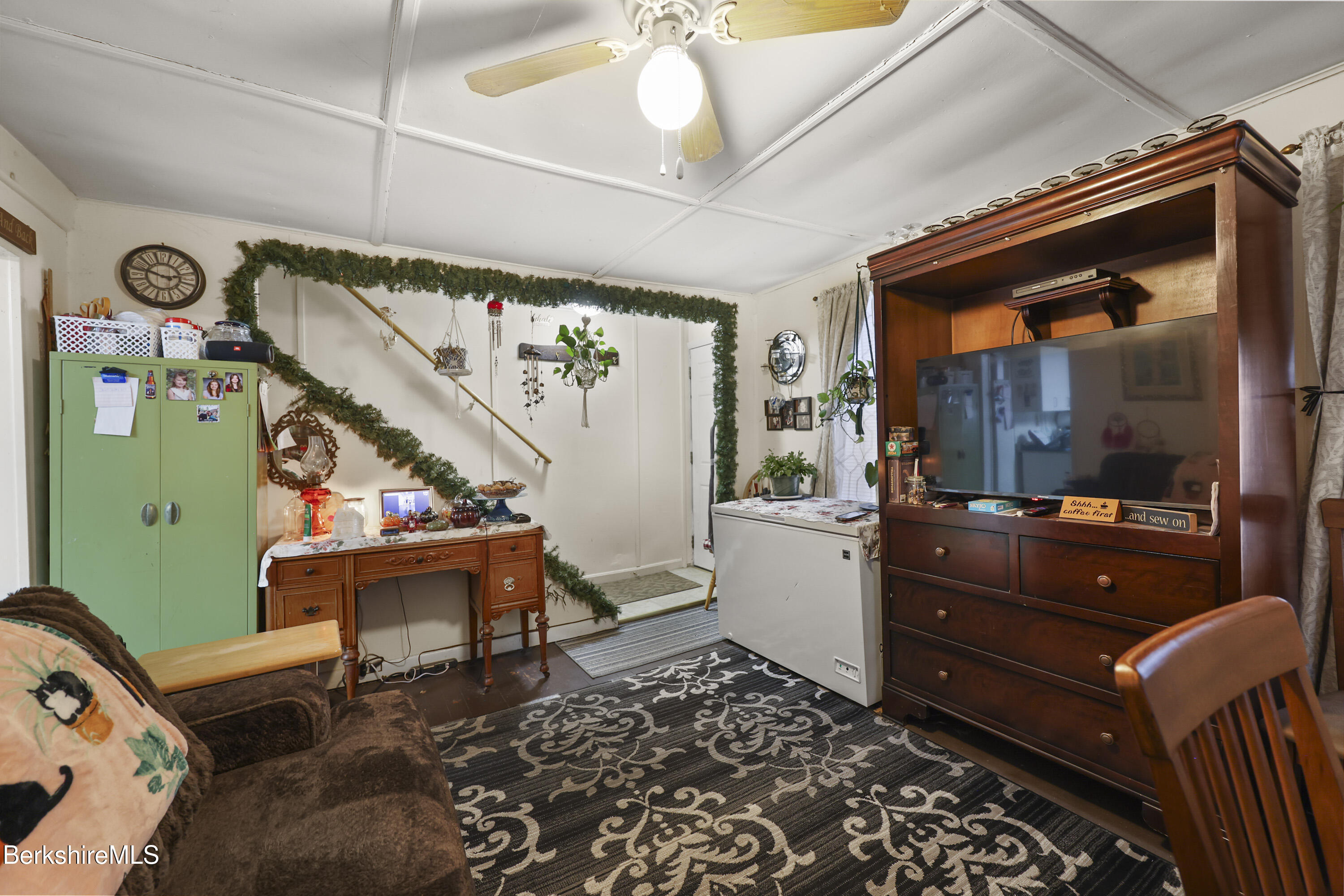 585-a & B State Road North Adams, MA 01247 - Photo 6 of 17 a room with furniture a chandelier and a window