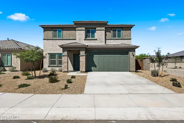 a front view of a house with entertaining space