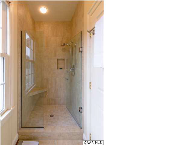 3333 Darby Road, Unit T271 Keswick, VA 22947 - Photo 17 of 32 a bathroom with a shower