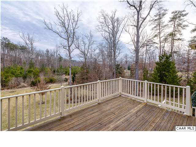 3333 Darby Road, Unit T271 Keswick, VA 22947 - Photo 24 of 32 a view of balcony with wooden floor and fence