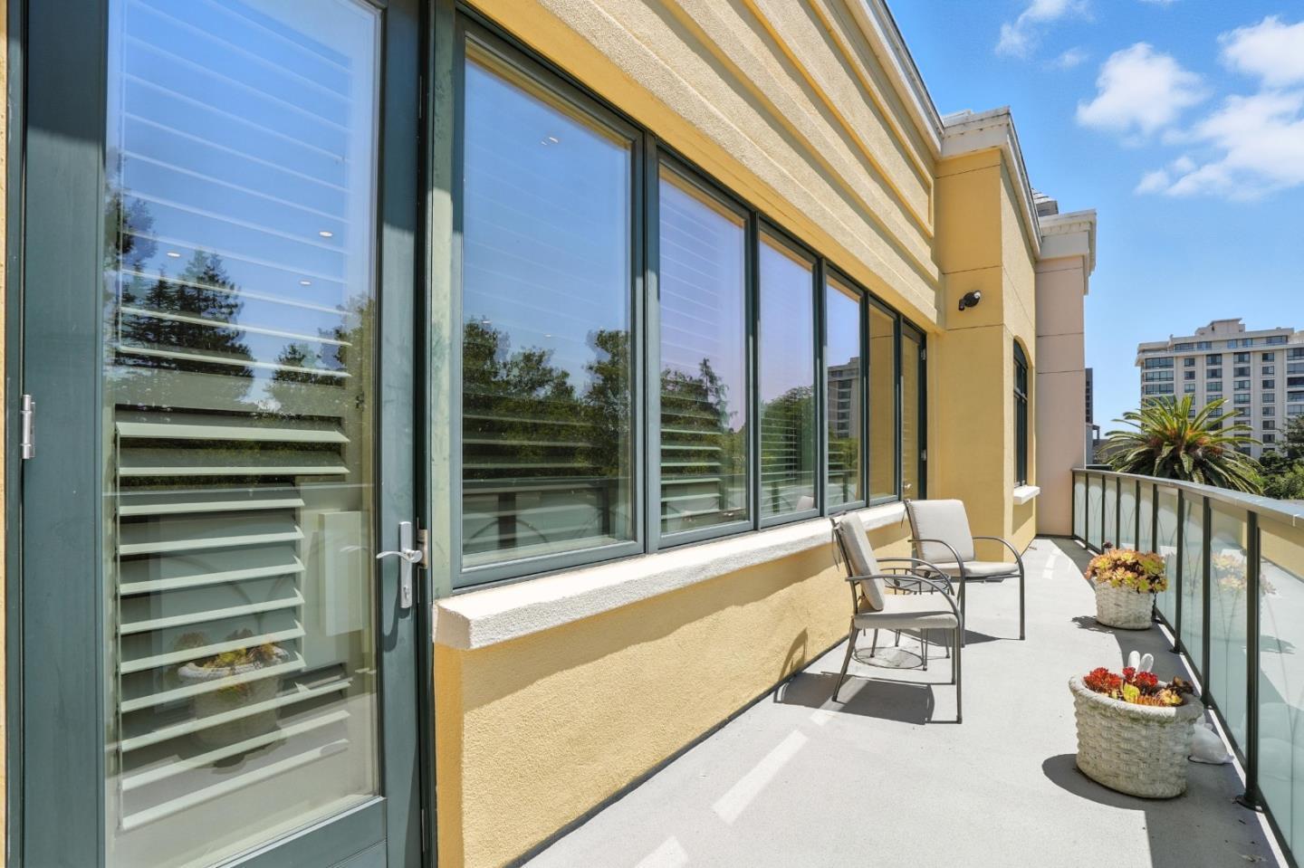 10 Crystal Springs Road, Unit 1507 San Mateo, CA 94402 - Photo 22 of 33 a view of balcony with chairs and potted plant