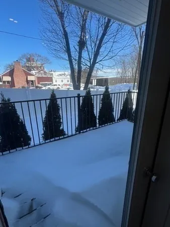 a view of a entryway with wooden walls