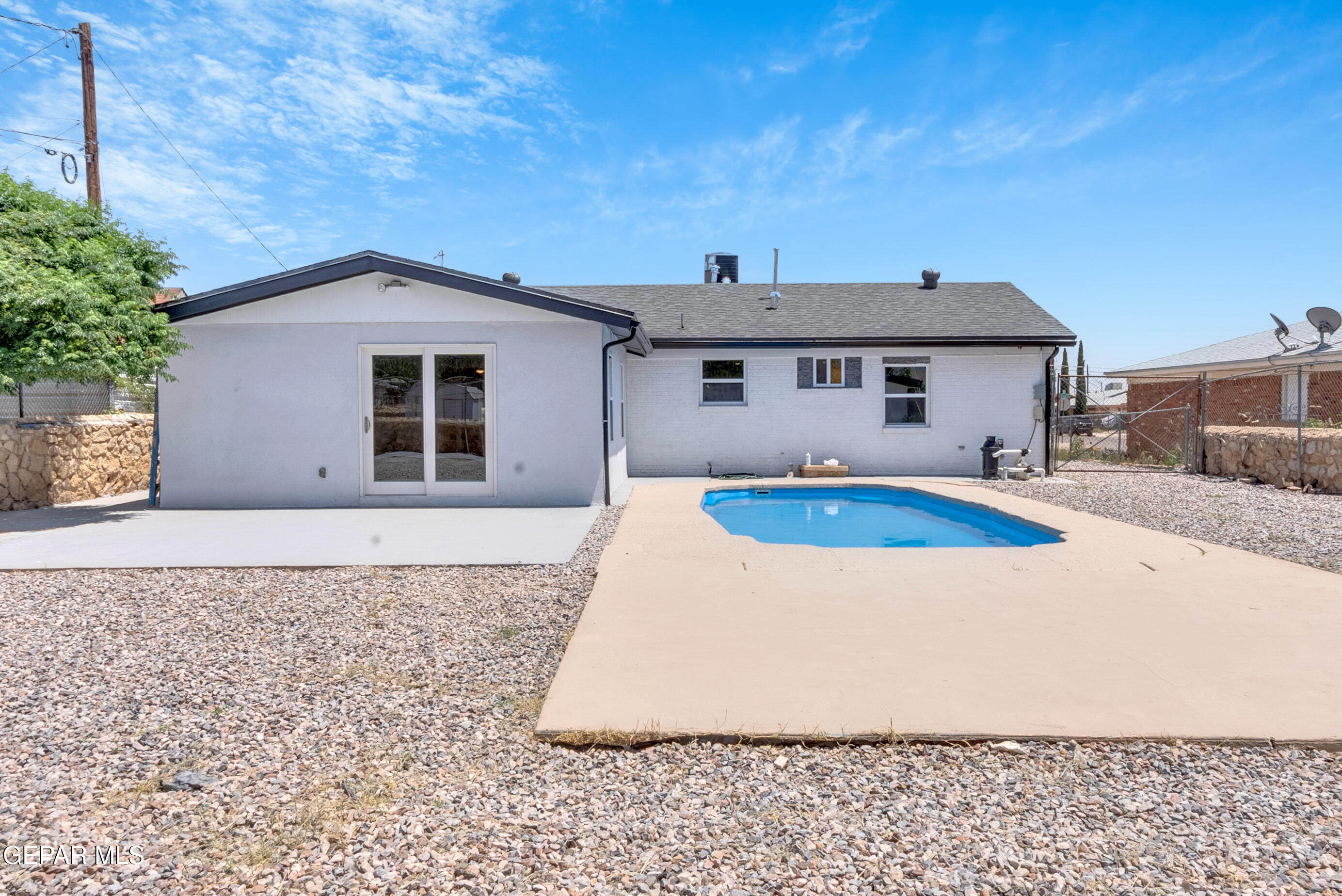 10141 Alcan Street El Paso, TX 79924 - Photo 20 of 49 a house view with a backyard space