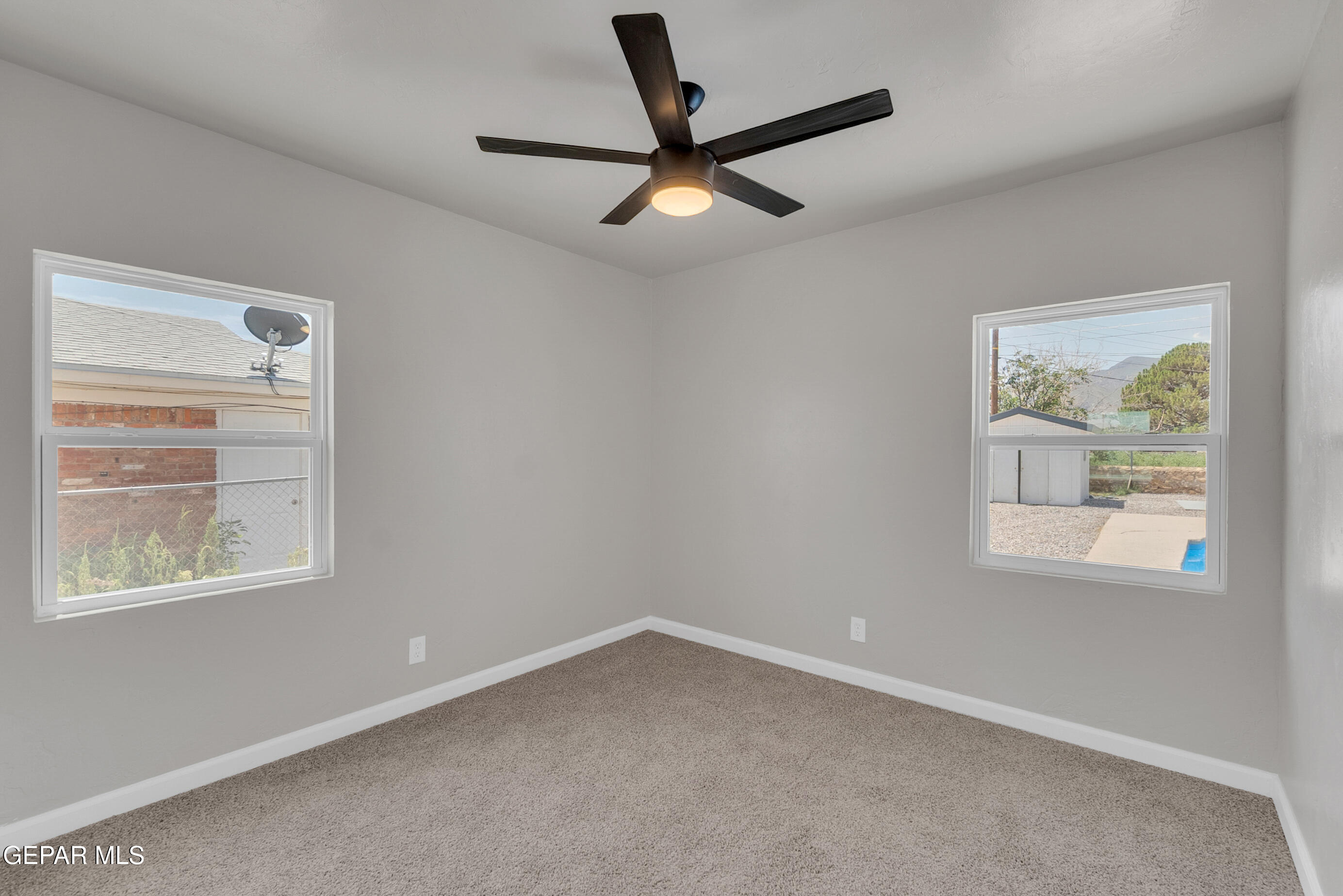 10141 Alcan Street El Paso, TX 79924 - Photo 38 of 49 wooden floor in an empty room with a window