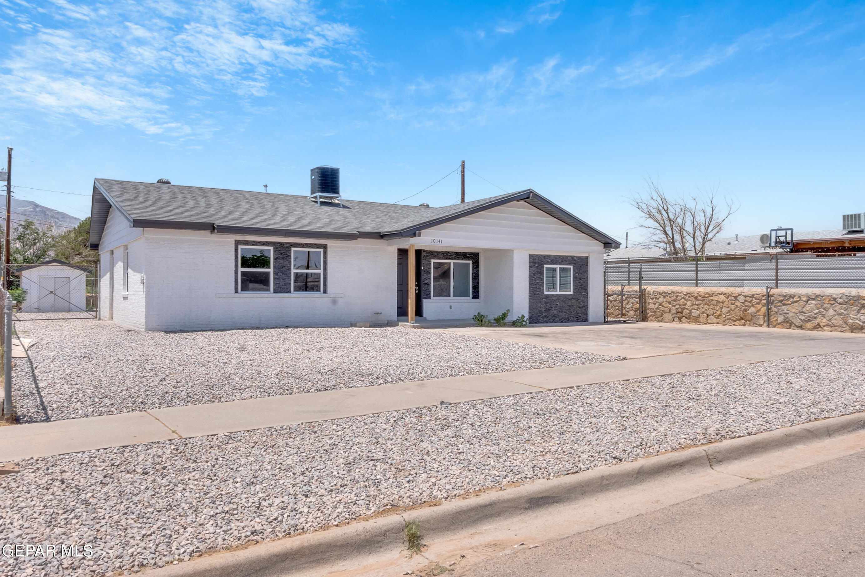 10141 Alcan Street El Paso, TX 79924 - Photo 44 of 49 front view of a house with a dry yard