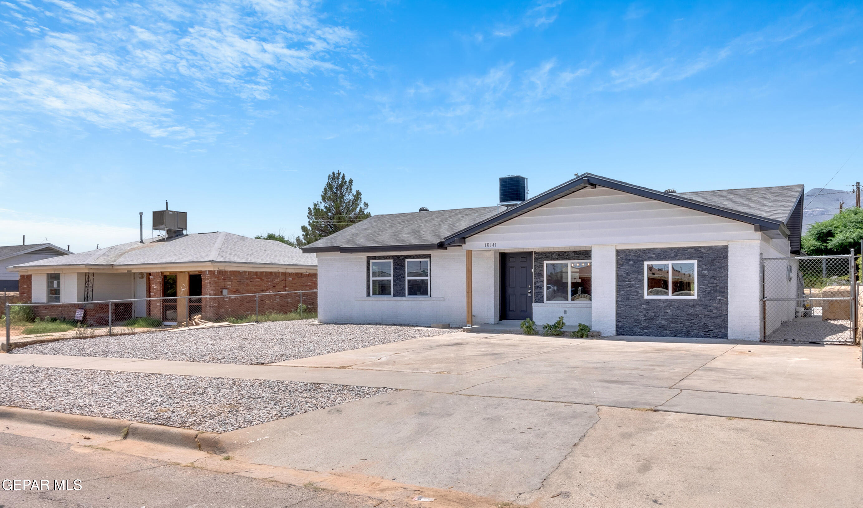 10141 Alcan Street El Paso, TX 79924 - Photo 45 of 49 a front view of a house with a yard