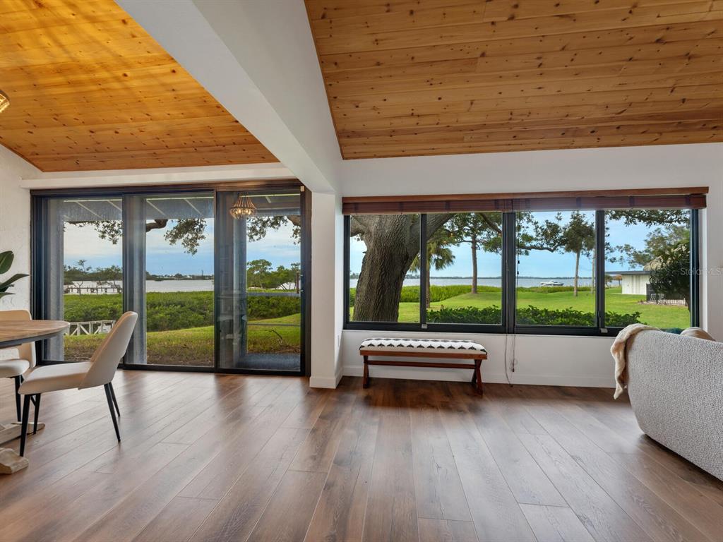 752 Sarabay Road, Unit 2 Osprey, FL 34229 - Photo 1 of 1 a view of a patio with a couple of chairs and a table