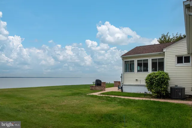 a view of a swimming pool with an outdoor space