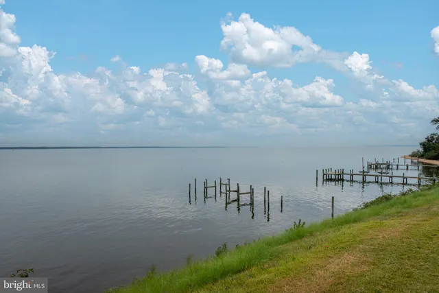 a front view of a building with garden