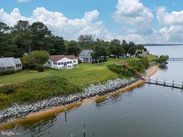 an aerial view of a house with a garden