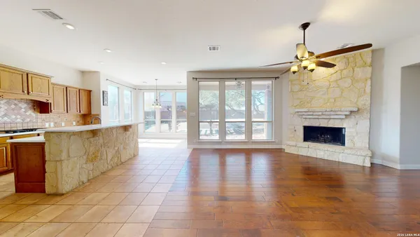 a kitchen with stainless steel appliances granite countertop a stove and a sink