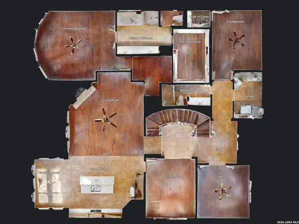 a view of a room with wooden floor and ceiling fan
