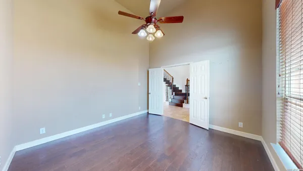 a view of a livingroom with wooden floor