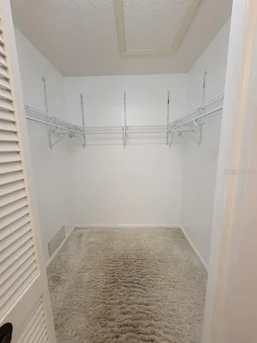 a view of a room with racks on the wall