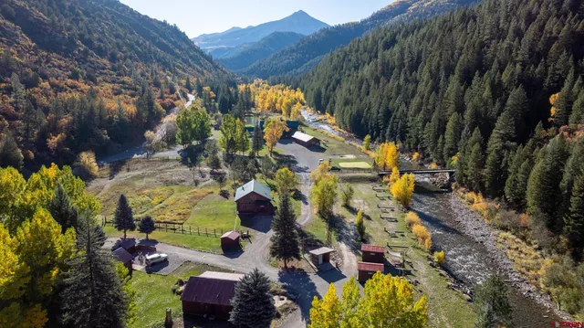 a view of swimming pool with sitting area