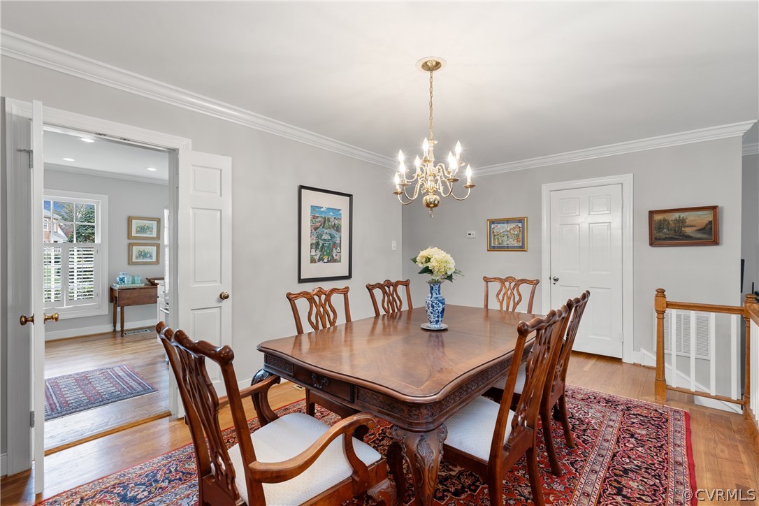 300 North Ridge Road, Unit 33 Henrico, VA 23229 - Photo 14 of 40 a view of a dining room with furniture and wooden floor