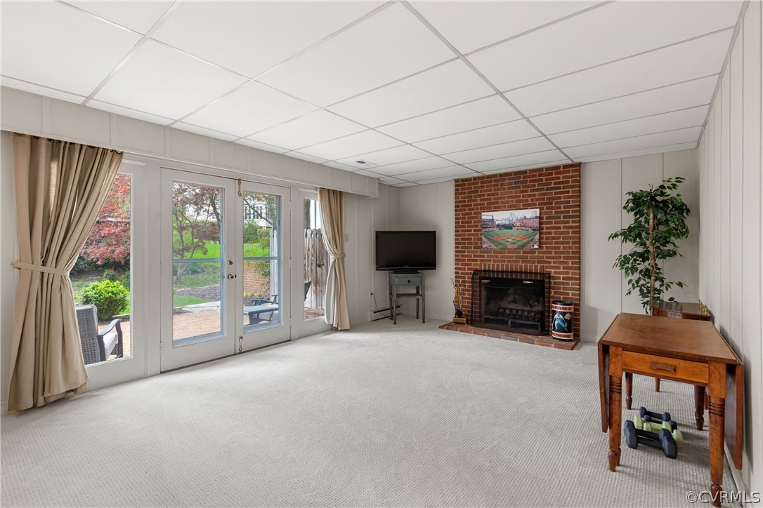 300 North Ridge Road, Unit 33 Henrico, VA 23229 - Photo 21 of 40 a view of a livingroom with a fireplace and a window