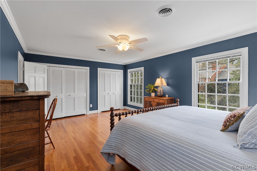 300 North Ridge Road, Unit 33 Henrico, VA 23229 - Photo 29 of 40 a bedroom with a bed and wooden floor