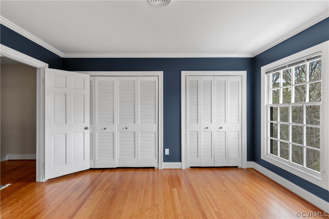 300 North Ridge Road, Unit 33 Henrico, VA 23229 - Photo 30 of 40 an empty room with wooden floor and windows