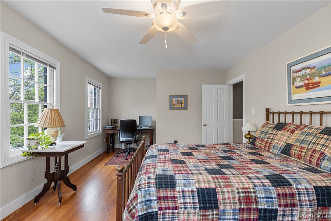 300 North Ridge Road, Unit 33 Henrico, VA 23229 - Photo 32 of 40 a bedroom with a bed and a chandelier