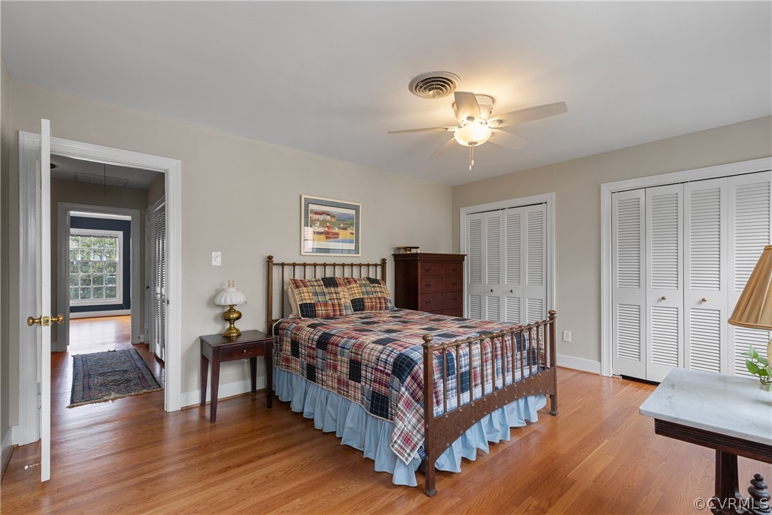300 North Ridge Road, Unit 33 Henrico, VA 23229 - Photo 34 of 40 a bedroom with a bed and a chandelier