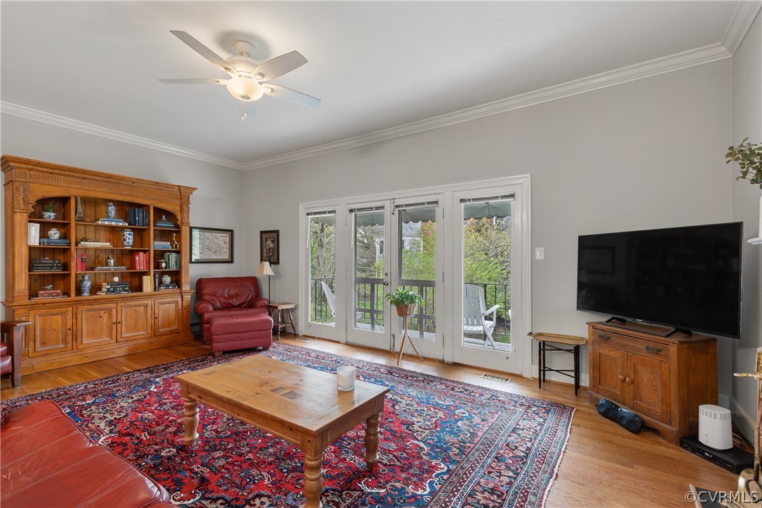 300 North Ridge Road, Unit 33 Henrico, VA 23229 - Photo 7 of 40 a living room with furniture a rug and a flat screen tv