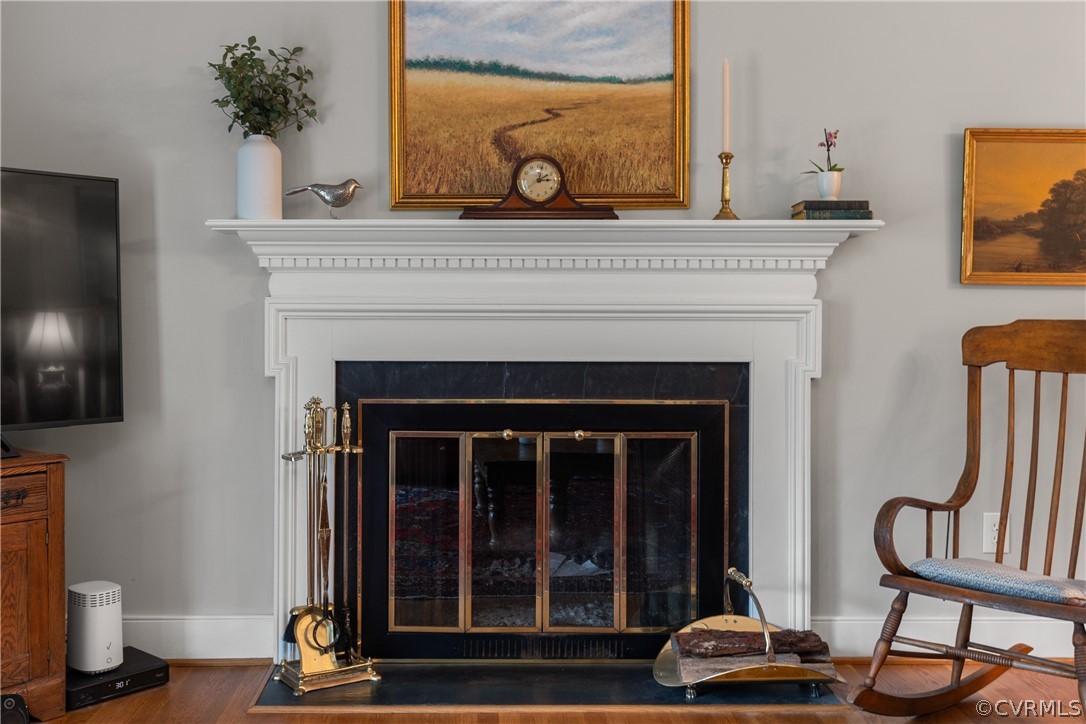 300 North Ridge Road, Unit 33 Henrico, VA 23229 - Photo 9 of 40 a living room with furniture and a fireplace