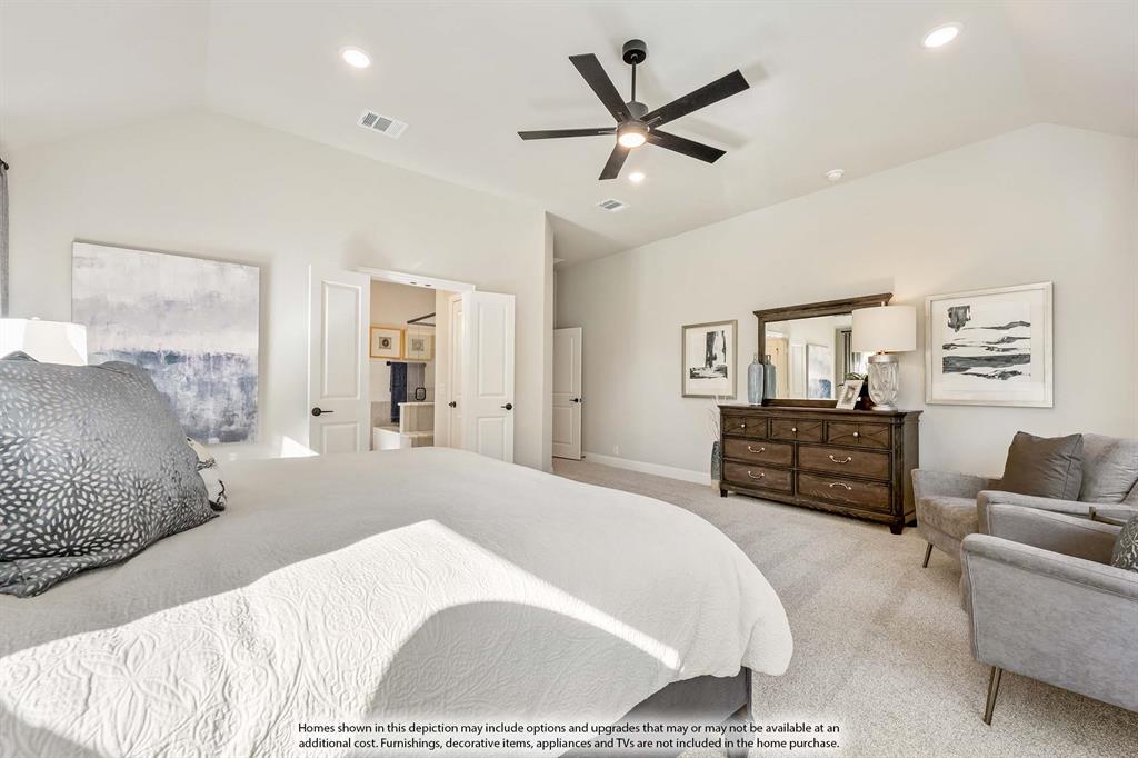 2206 Redding Drive Venus, TX 76084 - Photo 25 of 31 a spacious bedroom with a bed a couch and a chandelier