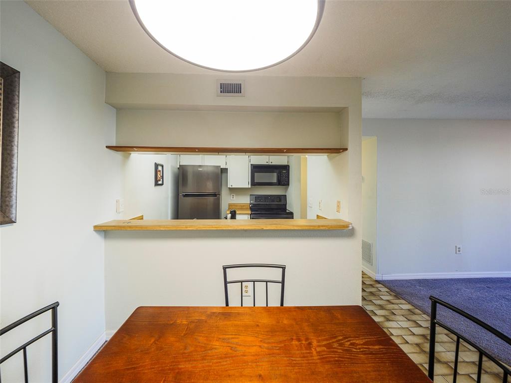 3235 South Beneva Road, Unit 101 Sarasota, FL 34232 - Photo 20 of 36 a bathroom with a sink and a mirror