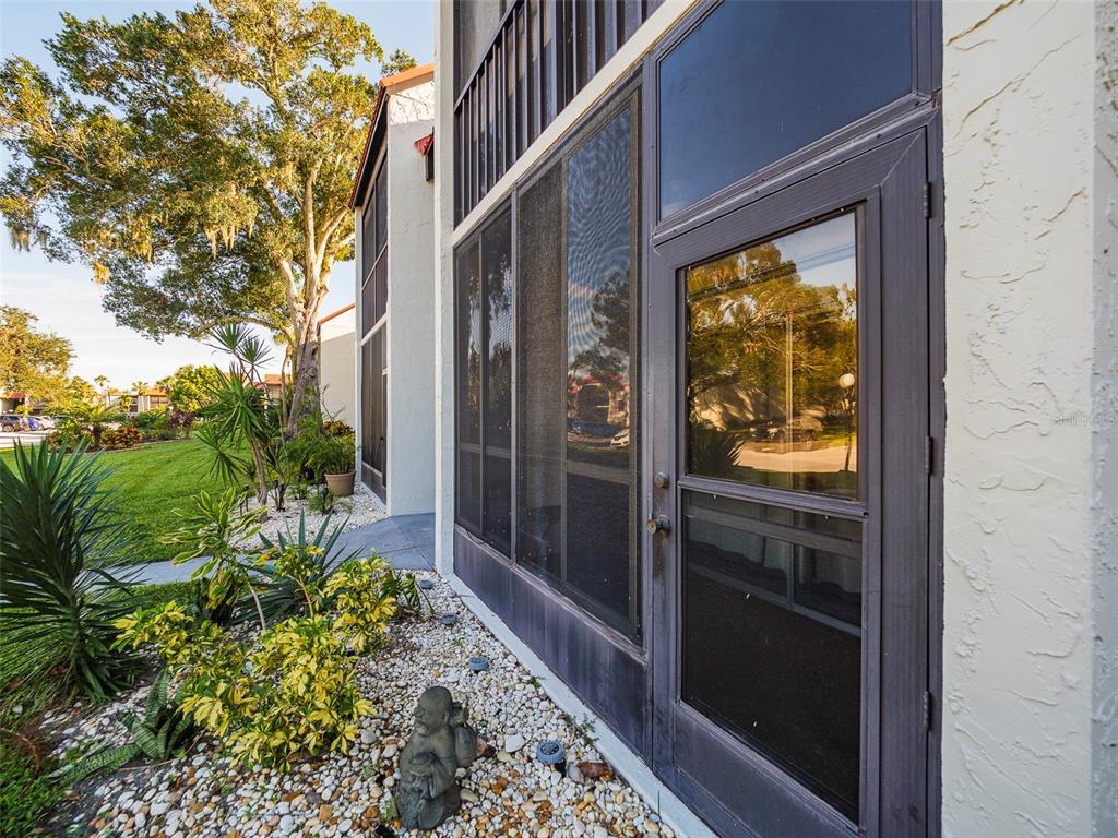 3235 South Beneva Road, Unit 101 Sarasota, FL 34232 - Photo 33 of 36 a view of a entryway door front of house