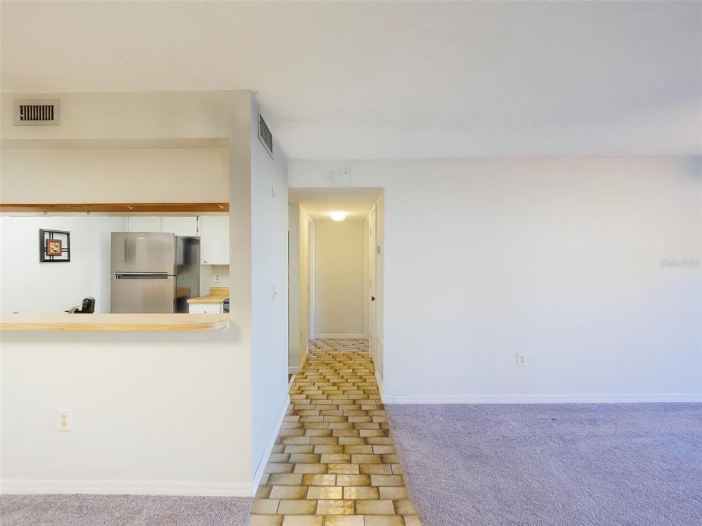 3235 South Beneva Road, Unit 101 Sarasota, FL 34232 - Photo 4 of 36 a view of a bathroom with a tub and mirror