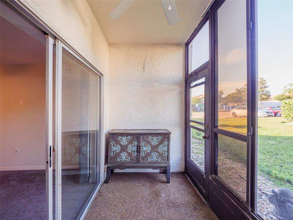 3235 South Beneva Road, Unit 101 Sarasota, FL 34232 - Photo 10 of 36 a view of an empty room and window