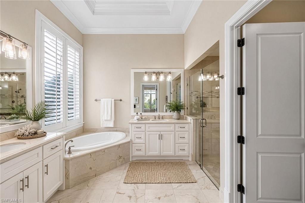 2277 Residence Circle Naples, FL 34105 - Photo 20 of 41 a bathroom with a granite countertop tub sink vanity granite and shower