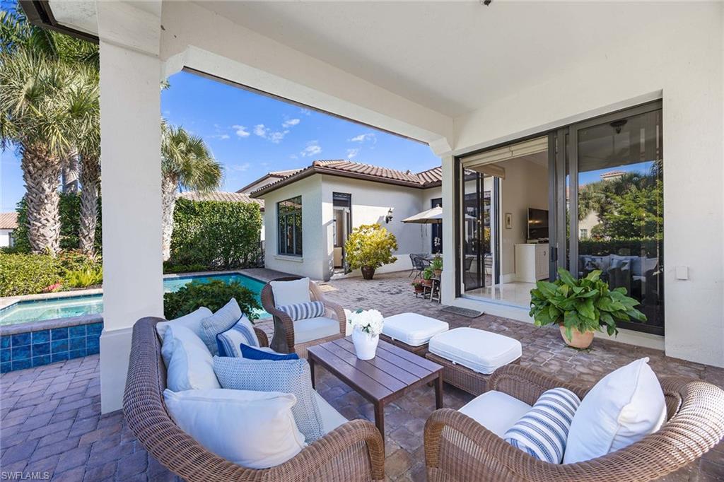 2277 Residence Circle Naples, FL 34105 - Photo 32 of 50 a view of a patio in the backyard