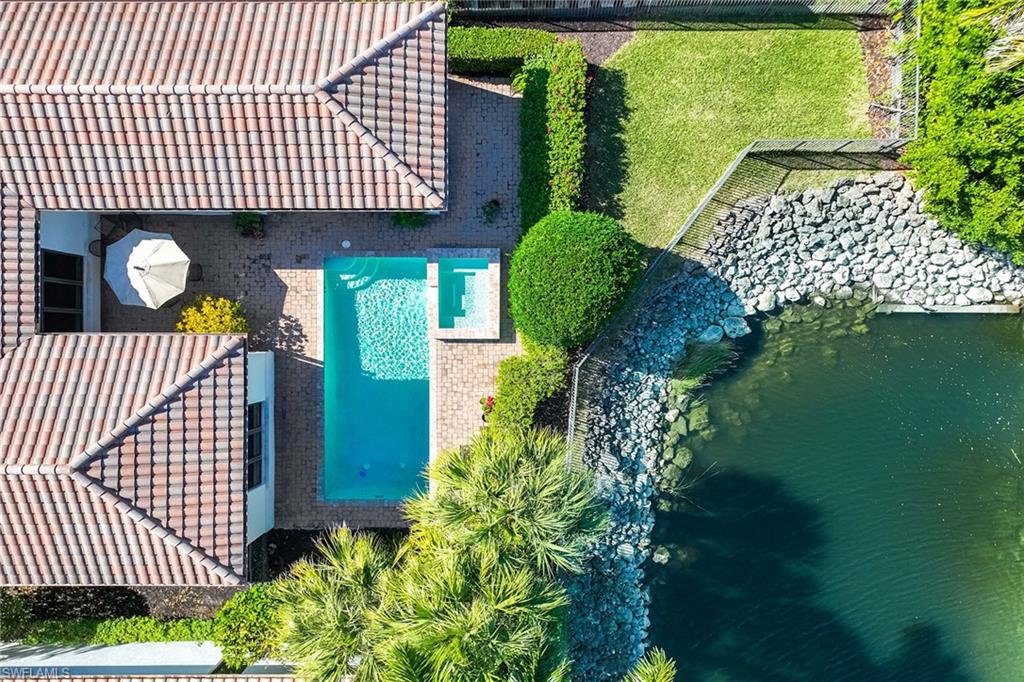 2277 Residence Circle Naples, FL 34105 - Photo 32 of 41 a view of a backyard