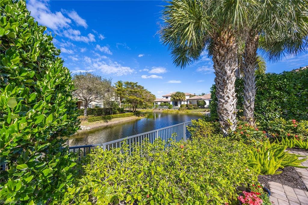 2277 Residence Circle Naples, FL 34105 - Photo 35 of 50 a view of a lake with a big yard